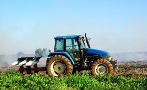 Blue tractor in portuguese field